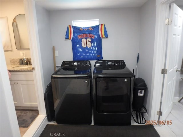 17457 Covello St, Van Nuys, CA 91406 - laundry area with washing machine and dryer and tile patterned flooring