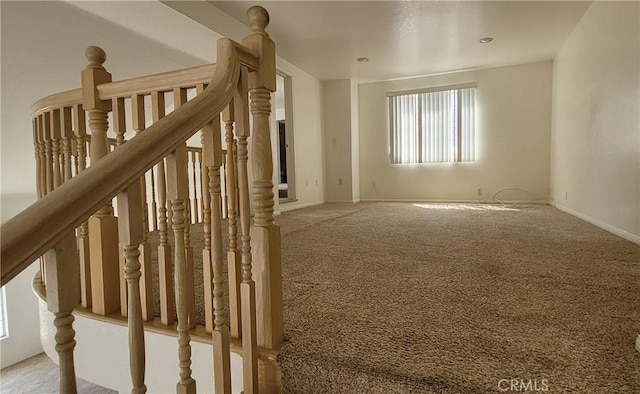 1389 Hillside St, Monterey Park, CA 91754 - unfurnished room with light colored carpet, baseboards, and stairs