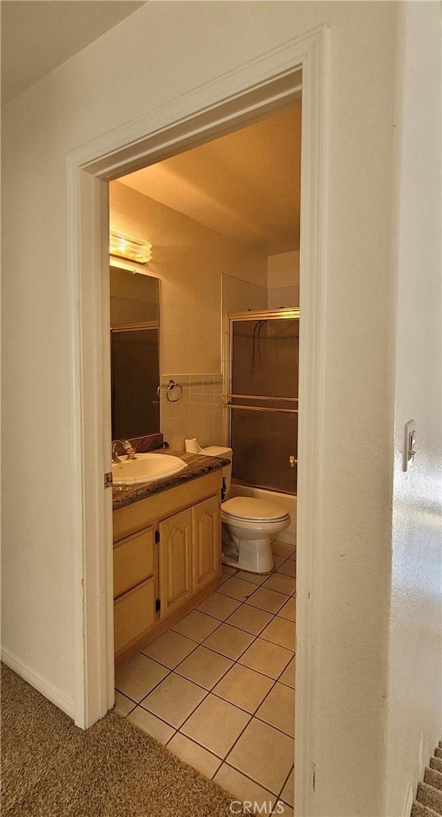 1389 Hillside St, Monterey Park, CA 91754 - bathroom with vanity, tile patterned floors, toilet, and a shower