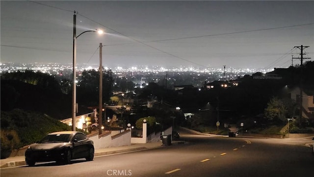 1389 Hillside St, Monterey Park, CA 91754 - view of asphalt street featuring curbs, street lights, and sidewalks