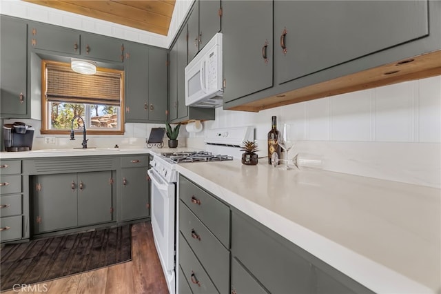 39335 Lark Rd, Big Bear Lake, CA 92315 - kitchen with white appliances, a sink, dark wood-type flooring, light countertops, and gray cabinetry