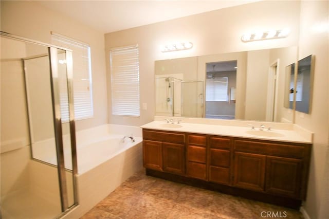 29113 Peppergrass Ave, Menifee, CA 92584 - bathroom featuring a stall shower, double vanity, and a garden tub