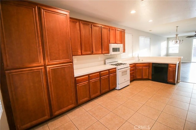 29113 Peppergrass Ave, Menifee, CA 92584 - kitchen featuring white appliances, light countertops, a peninsula, light tile patterned flooring, and recessed lighting