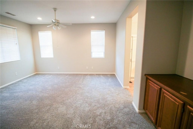 29113 Peppergrass Ave, Menifee, CA 92584 - unfurnished room featuring a ceiling fan, light colored carpet, recessed lighting, and baseboards