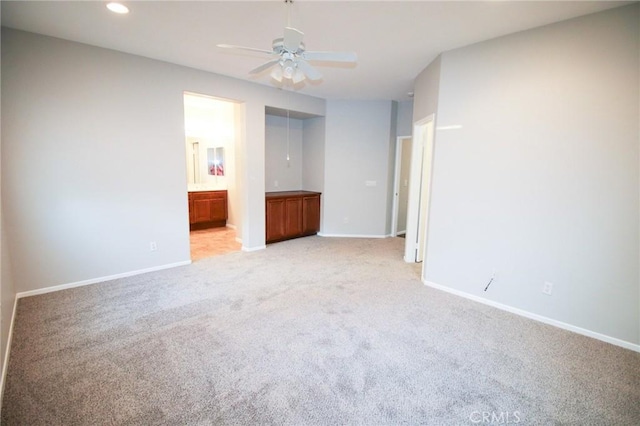 29113 Peppergrass Ave, Menifee, CA 92584 - unfurnished room with light carpet, a ceiling fan, baseboards, and recessed lighting