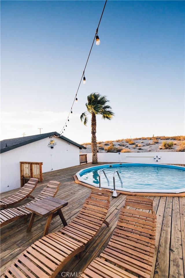 63326 Sunny Sands Dr, Joshua Tree, CA 92252 - view of swimming pool with a wooden deck