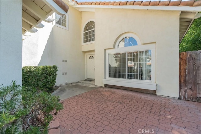 25213 Via Las Lomas, Murrieta, CA 92562 - property entrance featuring stucco siding and a patio area