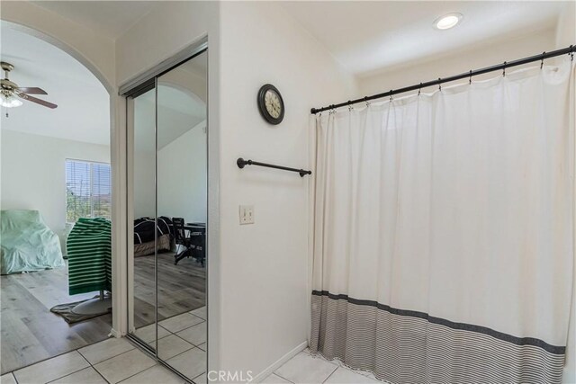 25213 Via Las Lomas, Murrieta, CA 92562 - full bath with tile patterned flooring, a ceiling fan, and curtained shower