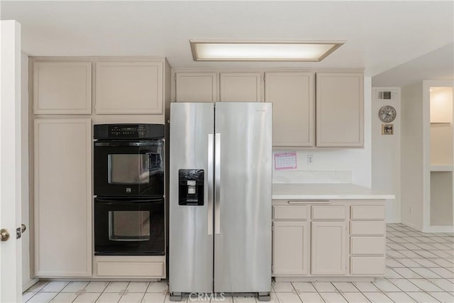 25213 Via Las Lomas, Murrieta, CA 92562 - kitchen featuring stainless steel refrigerator with ice dispenser, light countertops, and cream cabinets