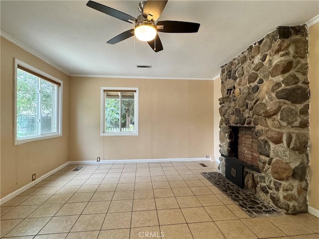 8 Geneva Ln, Chico, CA 95926 - unfurnished living room featuring plenty of natural light, crown molding, baseboards, light tile patterned floors, and ceiling fan