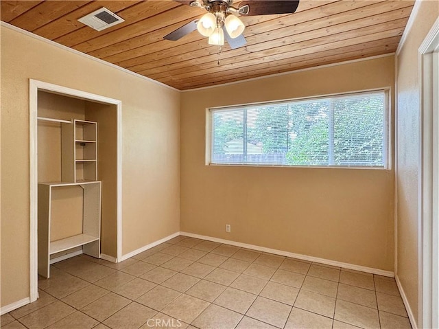 8 Geneva Ln, Chico, CA 95926 - unfurnished bedroom with wooden ceiling, light tile patterned floors, ornamental molding, baseboards, and a ceiling fan