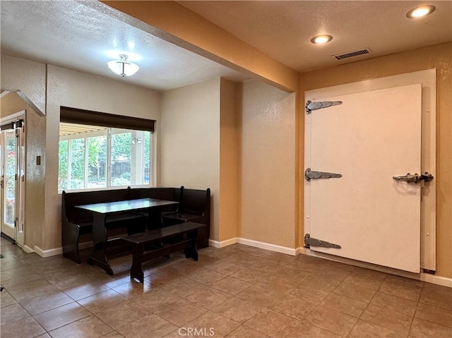 8 Geneva Ln, Chico, CA 95926 - interior space featuring a textured ceiling, light tile patterned floors, recessed lighting, and a textured wall