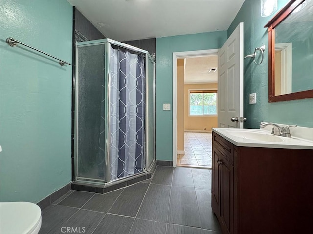 8 Geneva Ln, Chico, CA 95926 - full bathroom with a shower stall, vanity, and tile patterned floors