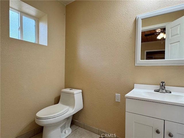 8 Geneva Ln, Chico, CA 95926 - half bath featuring vanity, tile patterned floors, and ceiling fan