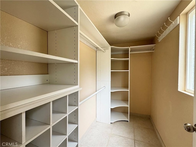 8 Geneva Ln, Chico, CA 95926 - walk in closet with light tile patterned flooring