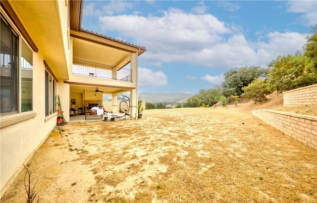 1189 Canyon Glen Rd, Chino Hills, CA 91709 - view of yard with a balcony, a patio area, and a ceiling fan