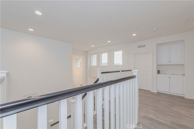 1189 Canyon Glen Rd, Chino Hills, CA 91709 - corridor featuring an upstairs landing, light wood-style floors, and recessed lighting
