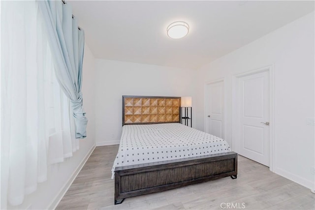 1189 Canyon Glen Rd, Chino Hills, CA 91709 - bedroom with light wood-style flooring and baseboards