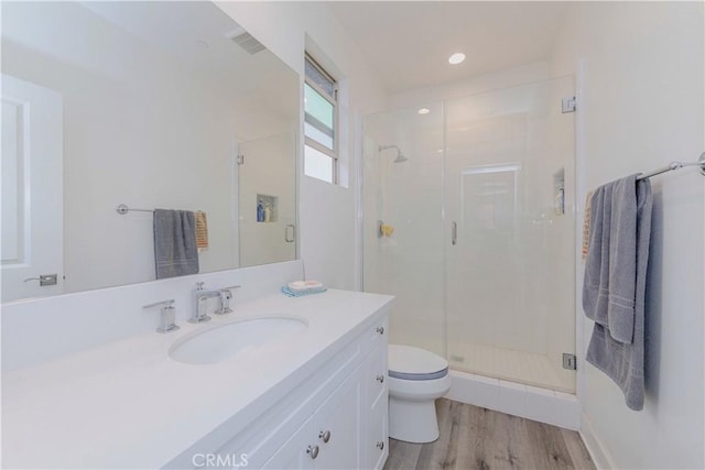 1189 Canyon Glen Rd, Chino Hills, CA 91709 - full bath with vanity, a shower stall, toilet, and wood finished floors