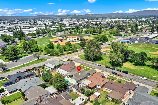 374 N Elm St, Orange, CA 92868 - aerial view of property and surrounding area featuring a mountainous background and nearby suburban area