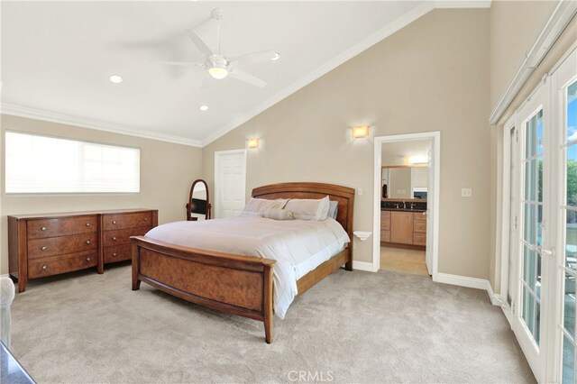 374 N Elm St, Orange, CA 92868 - bedroom with vaulted ceiling, light colored carpet, multiple windows, ornamental molding, and access to exterior