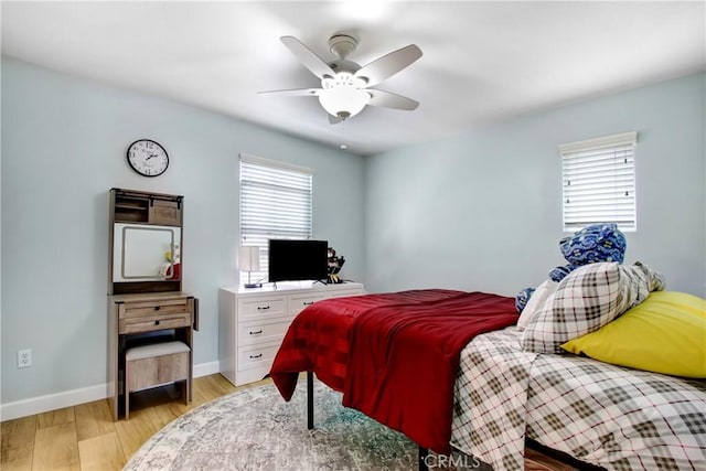 4533 Filson St, Riverside, CA 92507 - bedroom with light wood finished floors, baseboards, and a ceiling fan