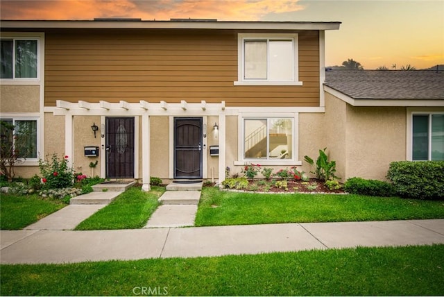 3021 S Sycamore St Unit D, Santa Ana, CA 92707 - multi unit property with a pergola, stucco siding, and a yard