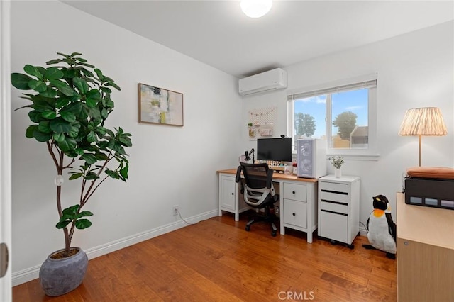 3021 S Sycamore St Unit D, Santa Ana, CA 92707 - office space with an AC wall unit and light wood-type flooring