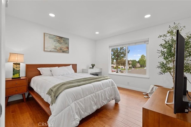 3021 S Sycamore St Unit D, Santa Ana, CA 92707 - bedroom featuring recessed lighting and wood finished floors