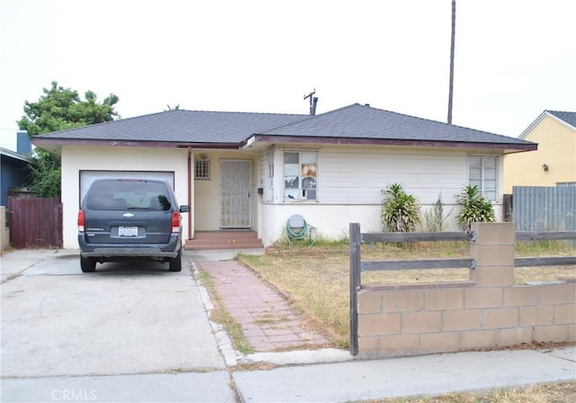 519 W 215th St, Carson, CA 90745 - ranch-style home with a fenced front yard, an attached garage, and driveway