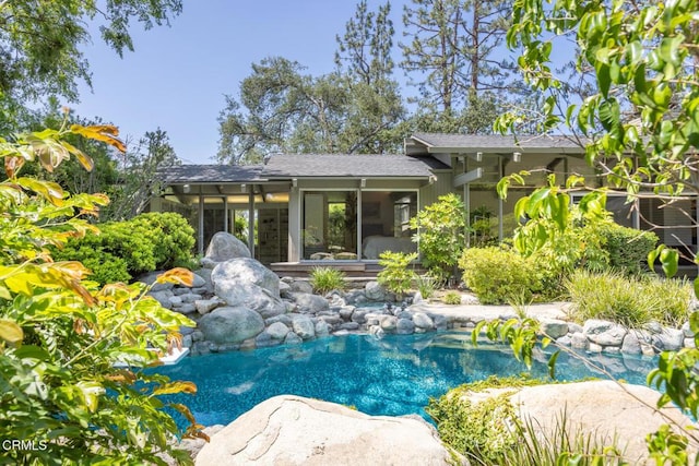 2279 Midwick Dr, Altadena, CA 91001 - swimming pool with a small pond and a sunroom