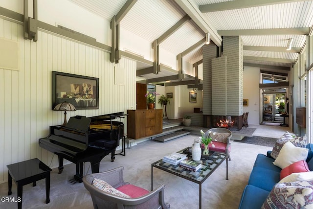 2279 Midwick Dr, Altadena, CA 91001 - carpeted living area featuring high vaulted ceiling, beamed ceiling, a large fireplace, and wood walls