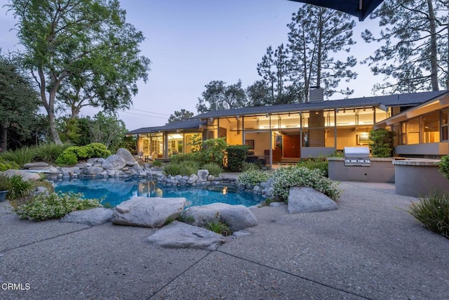 2279 Midwick Dr, Altadena, CA 91001 - swimming pool featuring a sunroom and a patio