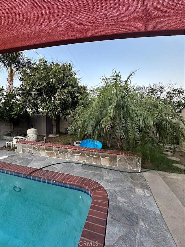 907 E Ghent St, Azusa, CA 91702 - view of pool featuring a patio area and area for grilling