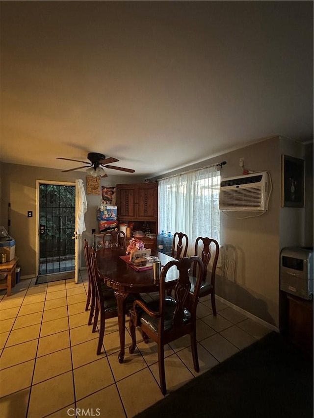 907 E Ghent St, Azusa, CA 91702 - dining area featuring a wall unit AC, light tile patterned flooring, and a ceiling fan