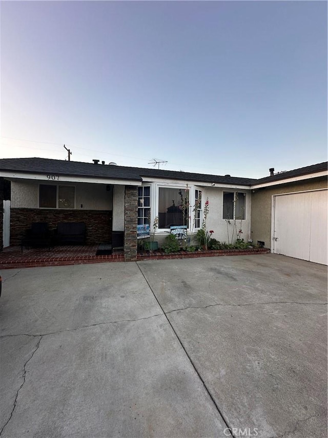 907 E Ghent St, Azusa, CA 91702 - ranch-style house with driveway and stucco siding