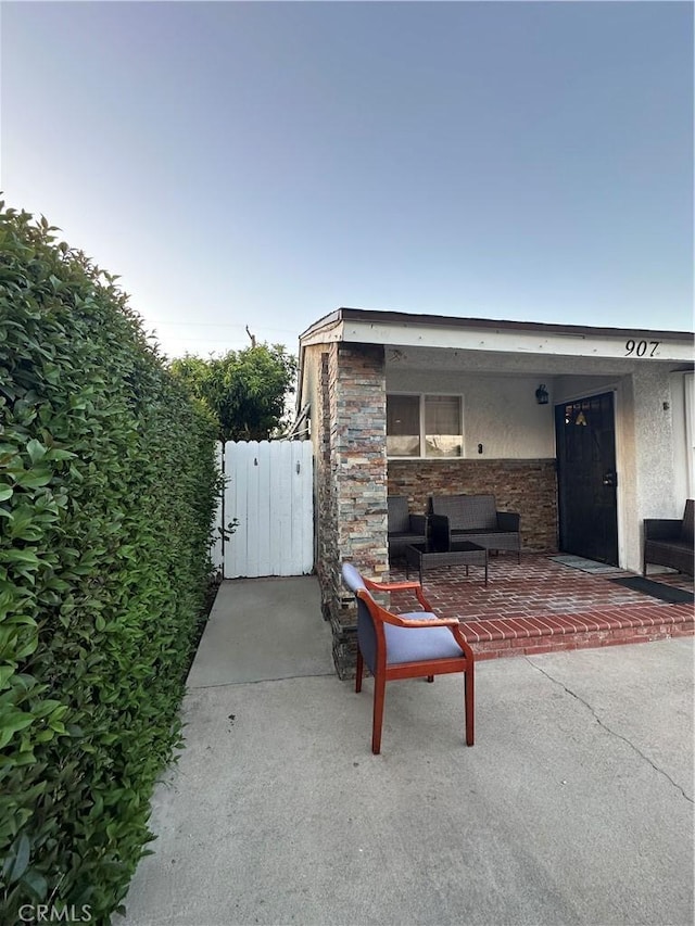 907 E Ghent St, Azusa, CA 91702 - covered porch with a gate