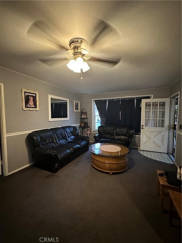 907 E Ghent St, Azusa, CA 91702 - living room featuring dark carpet and ceiling fan