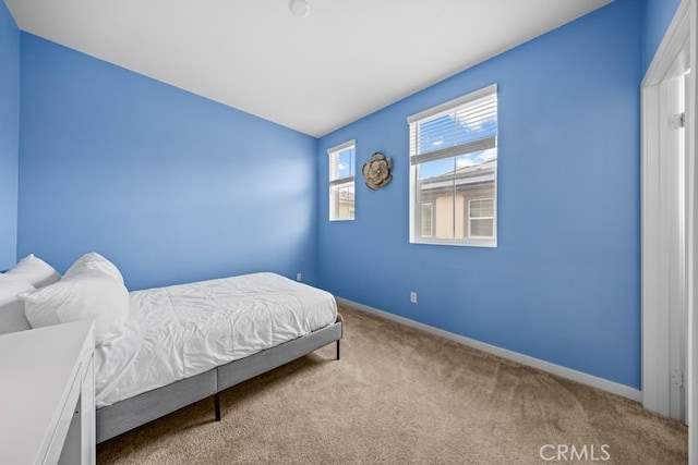 8254 Traveller St, Chino, CA 91708 - carpeted bedroom featuring baseboards