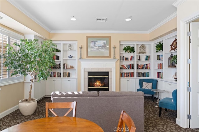 8254 Traveller St, Chino, CA 91708 - carpeted living area featuring crown molding, a fireplace, built in shelves, recessed lighting, and baseboards