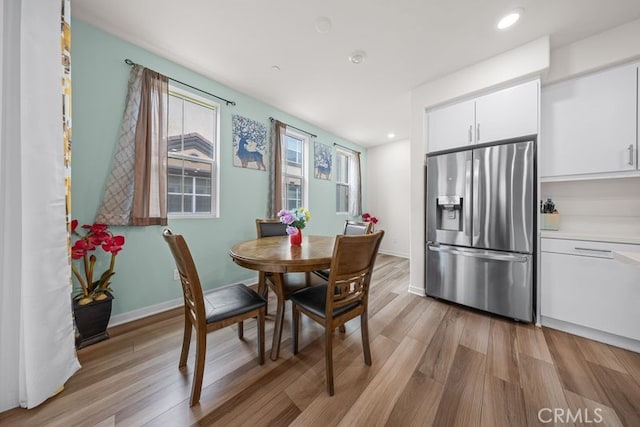 8254 Traveller St, Chino, CA 91708 - dining area featuring light wood-type flooring, recessed lighting, and baseboards