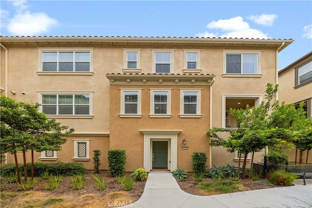 8254 Traveller St, Chino, CA 91708 - townhome / multi-family property featuring stucco siding