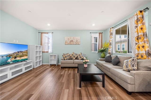 8254 Traveller St, Chino, CA 91708 - living area with wood finished floors, recessed lighting, and baseboards