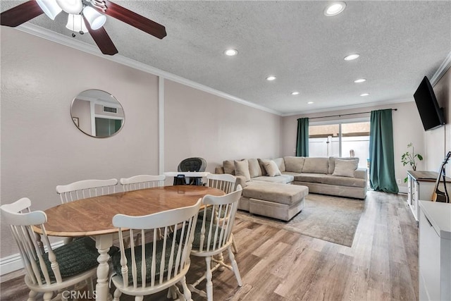 744 W Lambert Rd Unit 51, La Habra, CA 90631 - dining area featuring ornamental molding, light wood-style floors, a ceiling fan, recessed lighting, and a textured ceiling