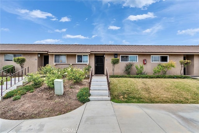 744 W Lambert Rd Unit 51, La Habra, CA 90631 - single story home with a front lawn and stucco siding