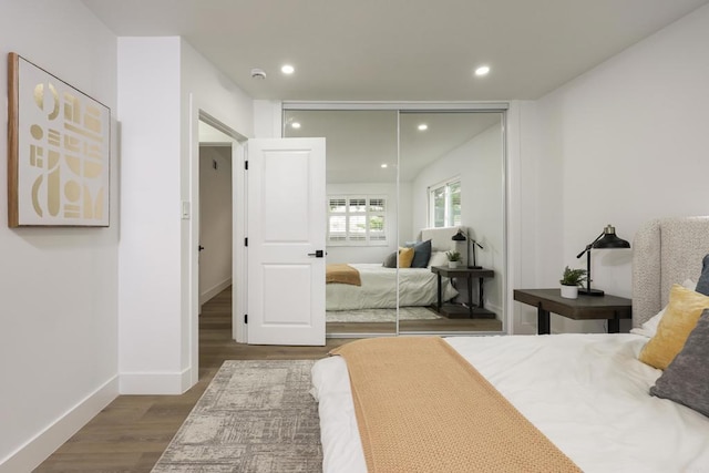 4380 Rolfe Rd, San Diego, CA 92117 - bedroom featuring a closet, wood finished floors, baseboards, and recessed lighting