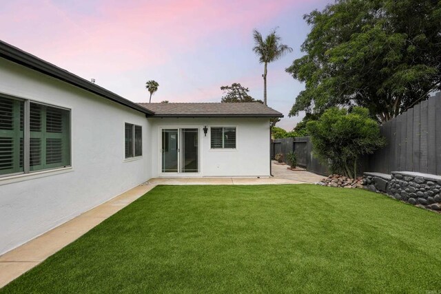 4380 Rolfe Rd, San Diego, CA 92117 - back of property featuring stucco siding and a patio