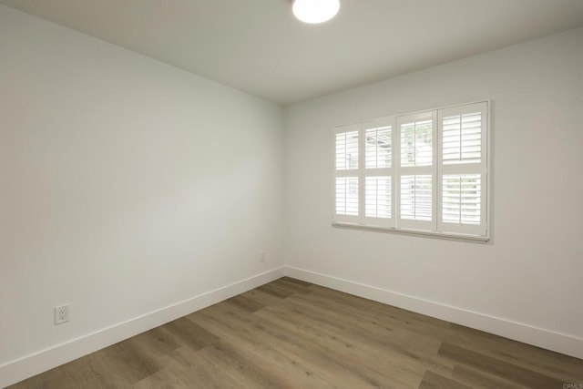 4380 Rolfe Rd, San Diego, CA 92117 - unfurnished room with baseboards and wood finished floors