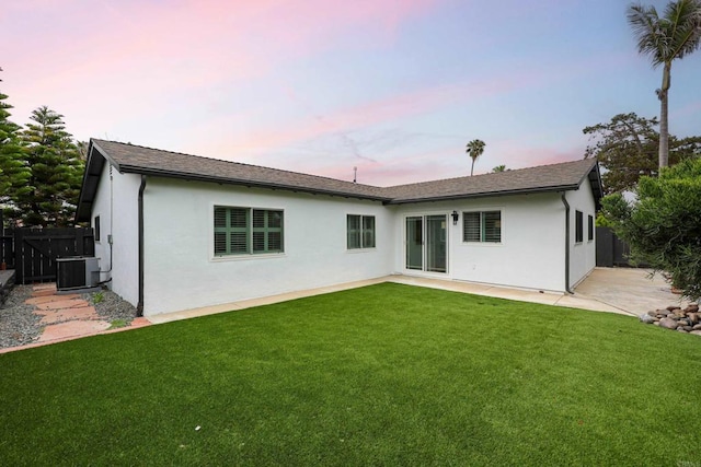 4380 Rolfe Rd, San Diego, CA 92117 - back of house at dusk featuring stucco siding, a patio, and cooling unit