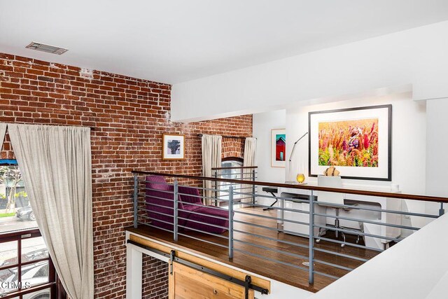 940 E 2nd St Unit 37, Los Angeles, CA 90012 - hall with brick wall
